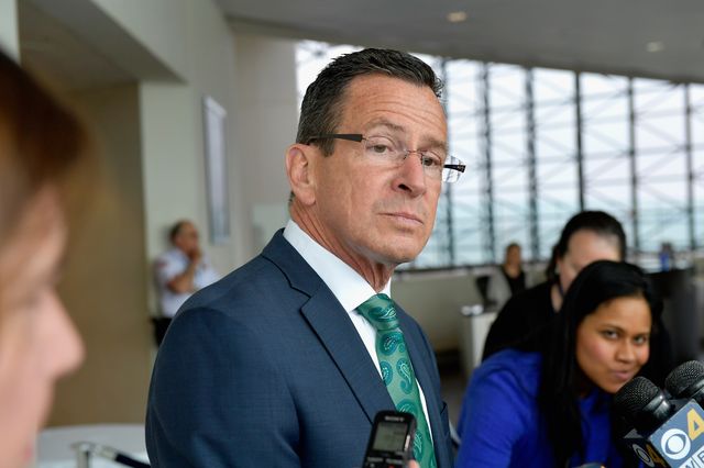 A photo of former Connecticut Governor Dannel Malloy after receiving the 2016 John F. Kennedy Profile in Courage Award.